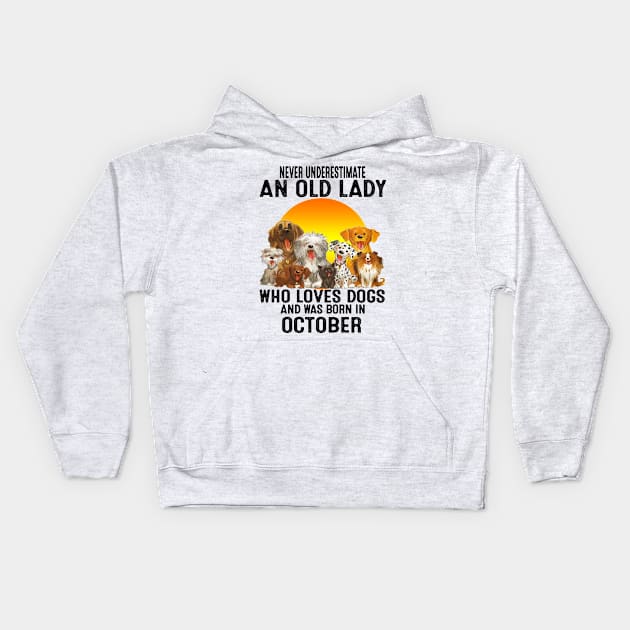 Never Underestimate An Old October Lady Who Loves Dogs Kids Hoodie by trainerunderline